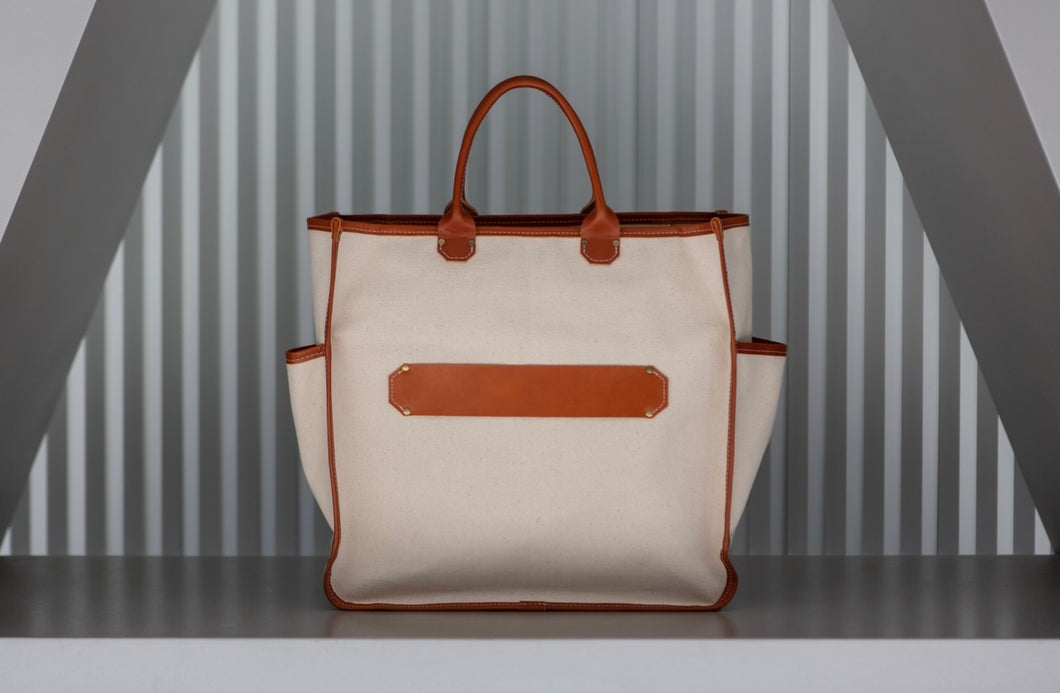 MAX canvas tote  Made in USA with leather piping.