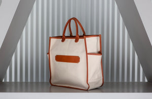 MAX canvas tote  Made in USA with leather piping.